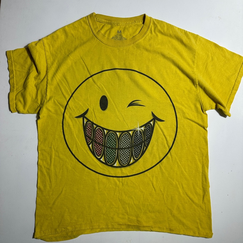 Yellow T-Shirt with Smiley Face Graphic